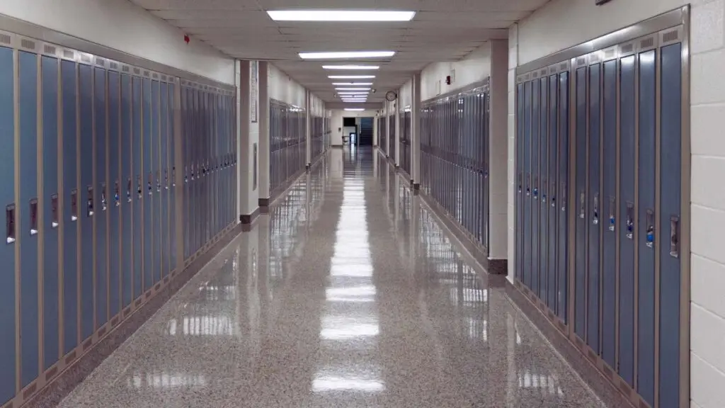 Empty school hallway representing warning signs and isolation associated with Ritalin addiction in teens