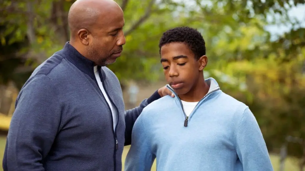 Parent offering support to a teen during a serious conversation about substance use