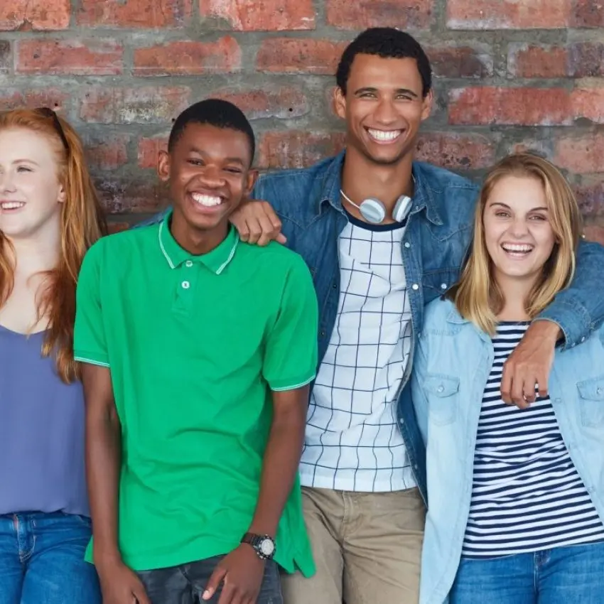 Teens smiling after completing their outpatient program Teens smiling after completing their outpatient program