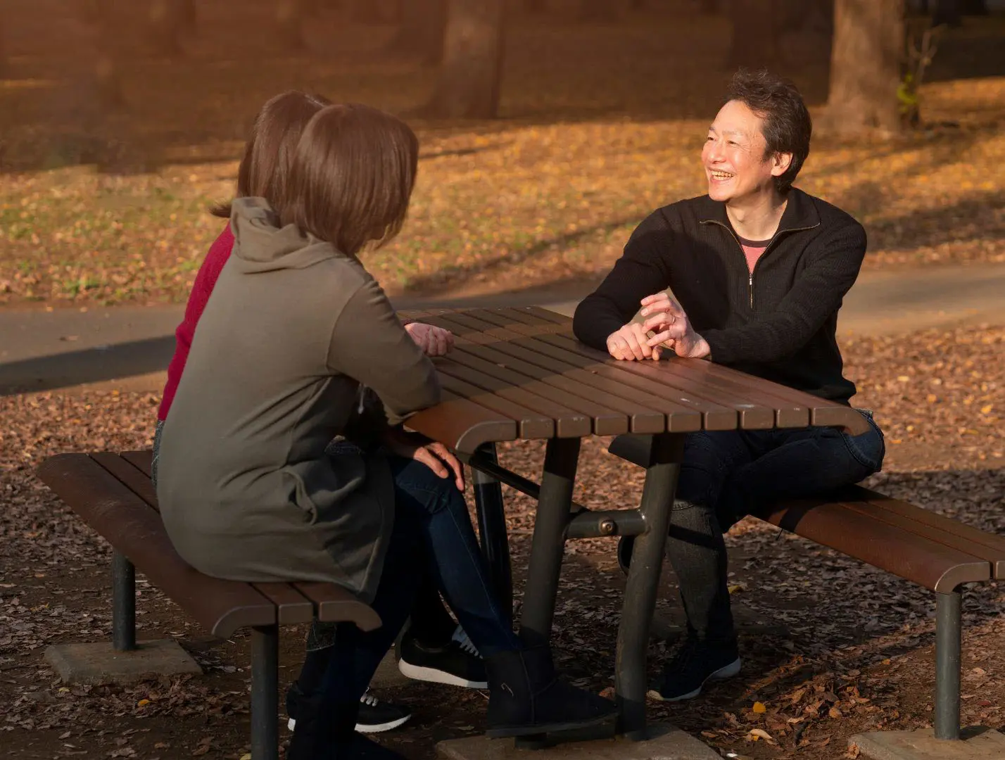 Teens at the park with their therapist as part of their OxyContin addiction treatment Teens at the park with their therapist as part of their OxyContin addiction treatment