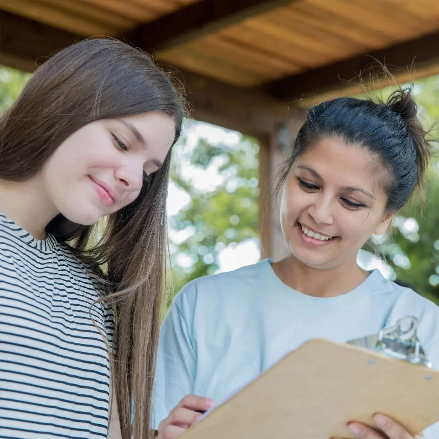 Therapist providing supportive trauma-informed counseling for adolescent Therapist providing supportive trauma-informed counseling for adolescent