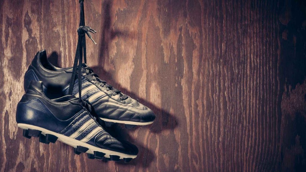 Unused soccer cleats symbolizing loss of interest caused by depression.